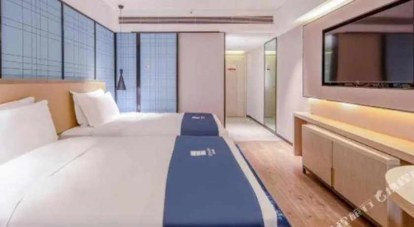 Bed in Echarm Hotel Nanning Qingxiu Mountain