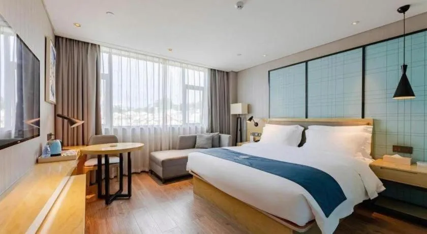 Bed in Echarm Hotel Nanning Qingxiu Mountain