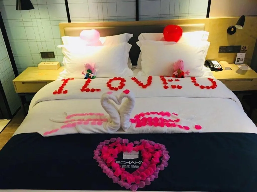 Bed in Echarm Hotel Nanning Qingxiu Mountain