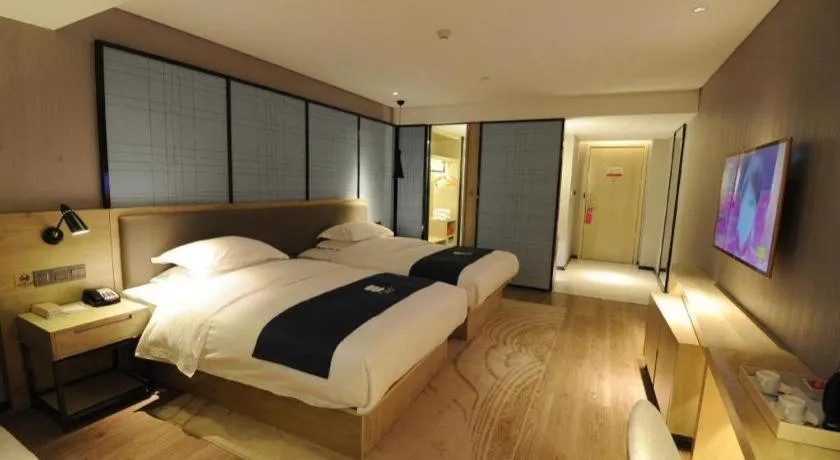 Bed in Echarm Hotel Nanning Qingxiu Mountain