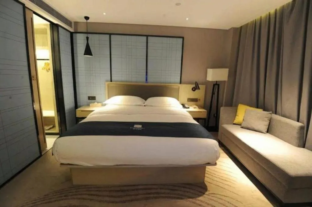 Bed in Echarm Hotel Nanning Qingxiu Mountain
