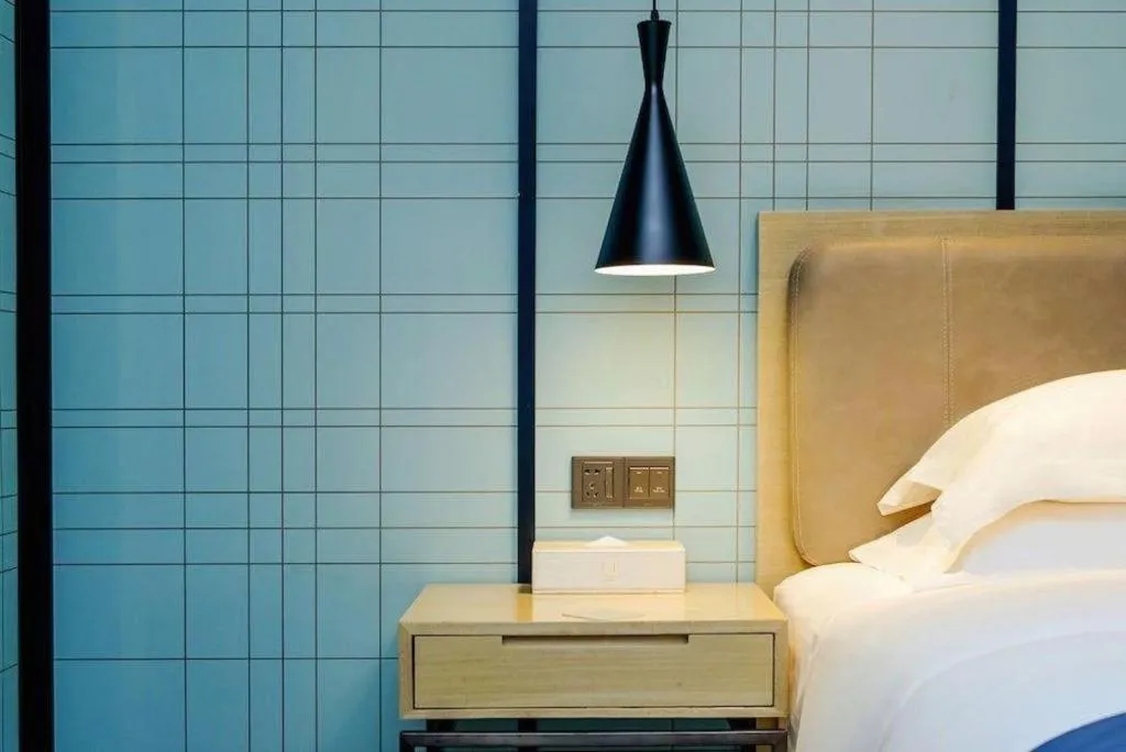 Bed in Echarm Hotel Nanning Qingxiu Mountain