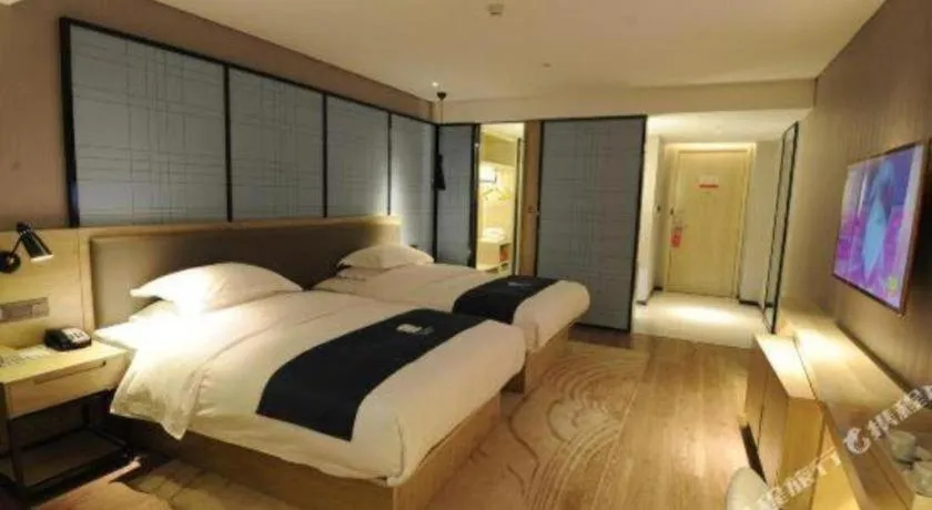 Bed in Echarm Hotel Nanning Qingxiu Mountain