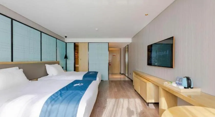 Bed in Echarm Hotel Nanning Qingxiu Mountain