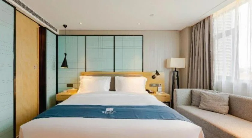 Bed in Echarm Hotel Nanning Qingxiu Mountain