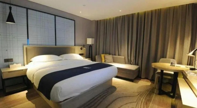 Bed in Echarm Hotel Nanning Qingxiu Mountain