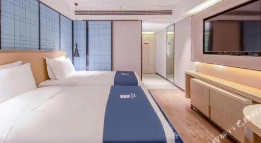 Bed in Echarm Hotel Nanning Qingxiu Mountain