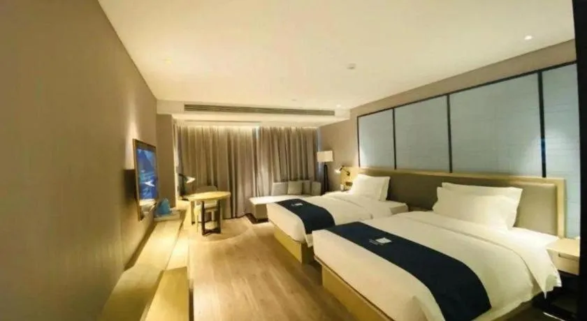 Bed in Echarm Hotel Nanning Qingxiu Mountain