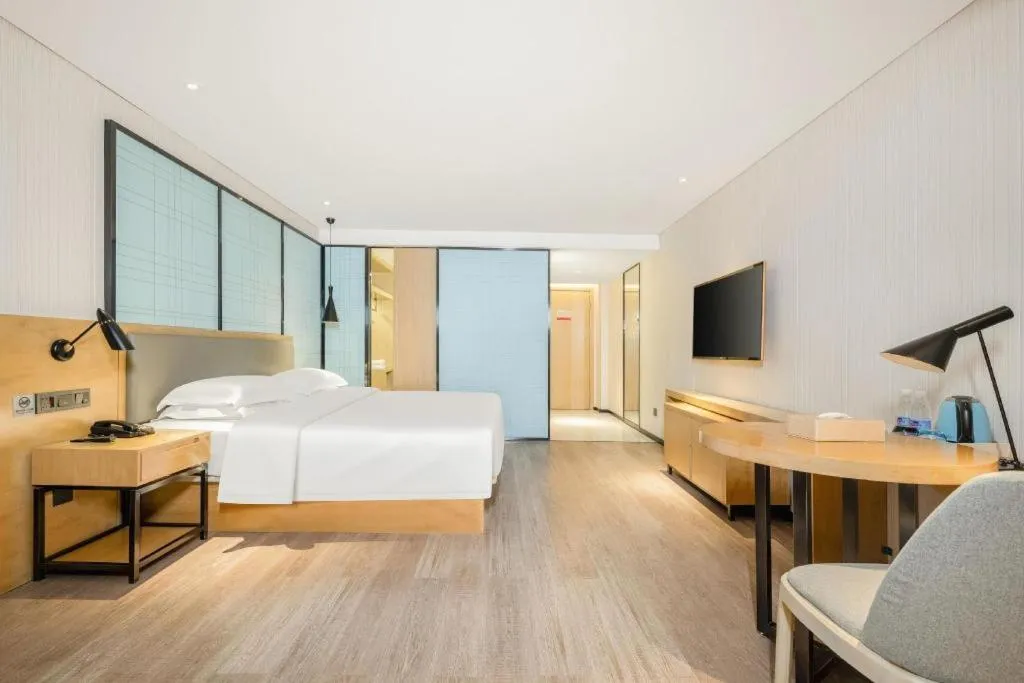 Bed in Echarm Hotel Nanning Qingxiu Mountain