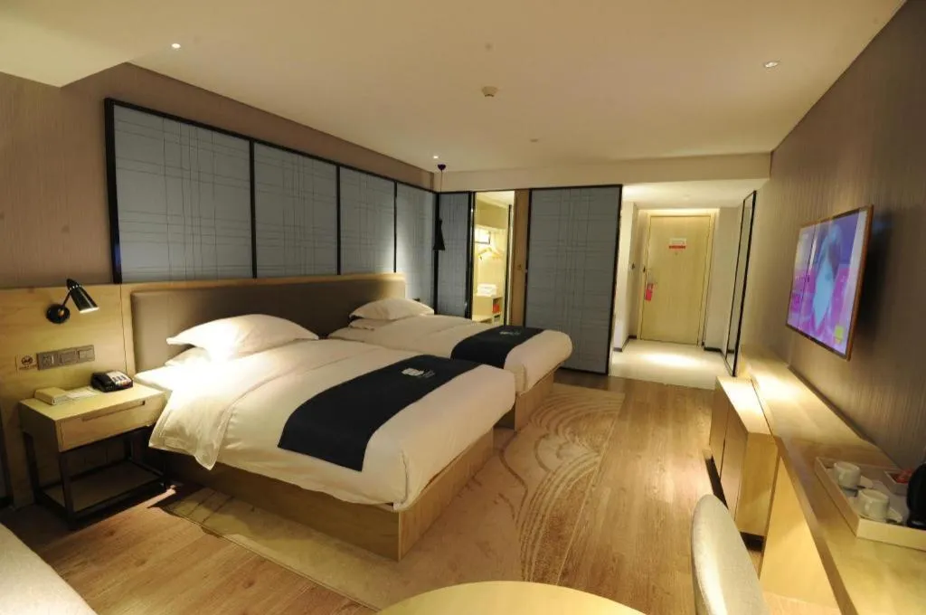 Bed in Echarm Hotel Nanning Qingxiu Mountain