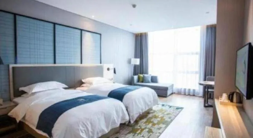 Bed in Echarm Hotel Nanning Qingxiu Mountain