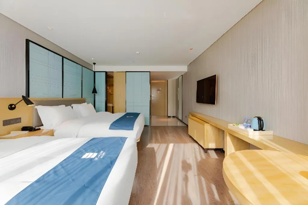 Bed in Echarm Hotel Nanning Qingxiu Mountain