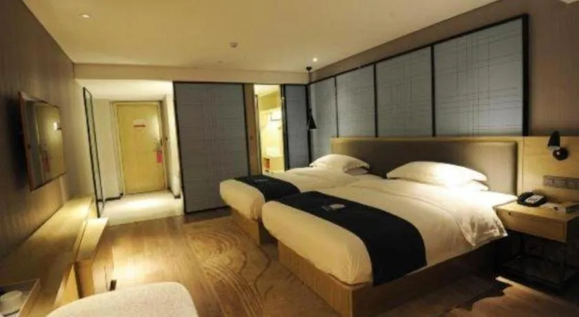 Bed in Echarm Hotel Nanning Qingxiu Mountain