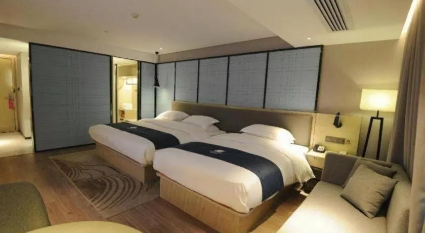 Bed in Echarm Hotel Nanning Qingxiu Mountain