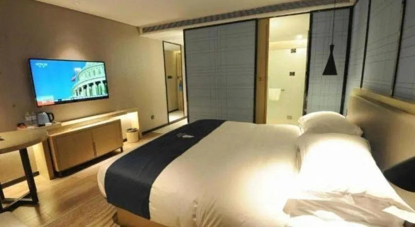 Bed in Echarm Hotel Nanning Qingxiu Mountain