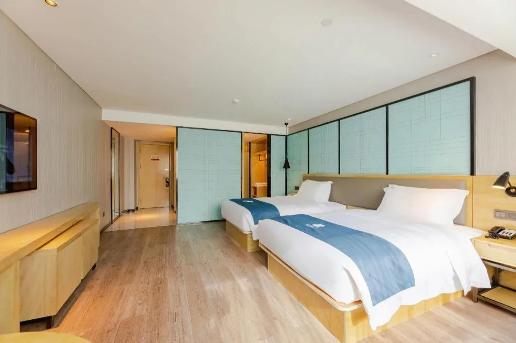 Bed in Echarm Hotel Nanning Qingxiu Mountain