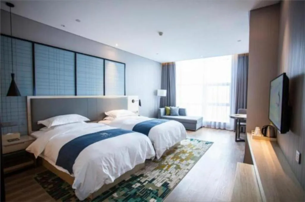 Bed in Echarm Hotel Nanning Qingxiu Mountain