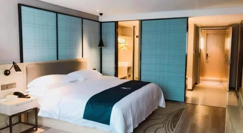 Bed in Echarm Hotel Nanning Qingxiu Mountain