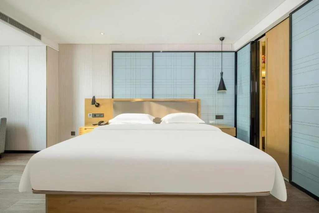 Bed in Echarm Hotel Nanning Qingxiu Mountain