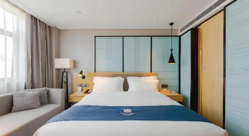 Bed in Echarm Hotel Nanning Qingxiu Mountain