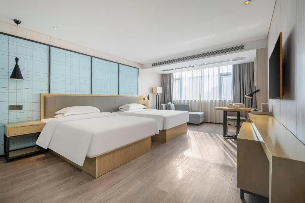 Bed in Echarm Hotel Nanning Qingxiu Mountain