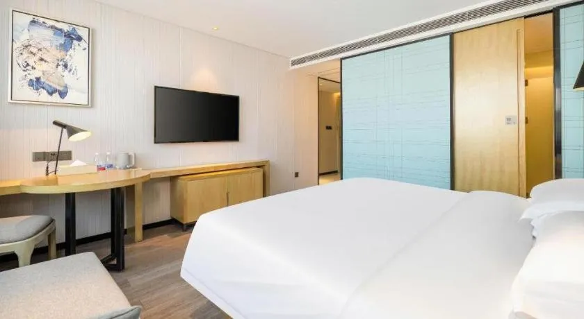 Bed in Echarm Hotel Nanning Qingxiu Mountain