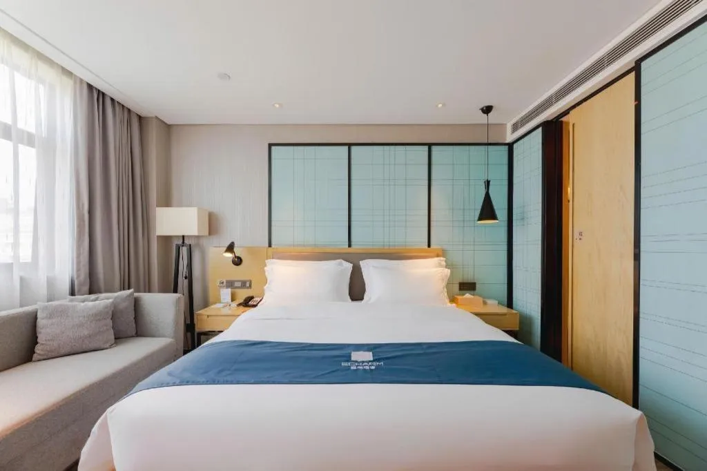 Bed in Echarm Hotel Nanning Qingxiu Mountain