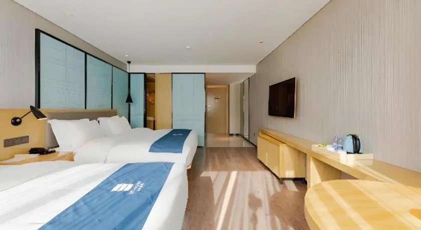 Bed in Echarm Hotel Nanning Qingxiu Mountain