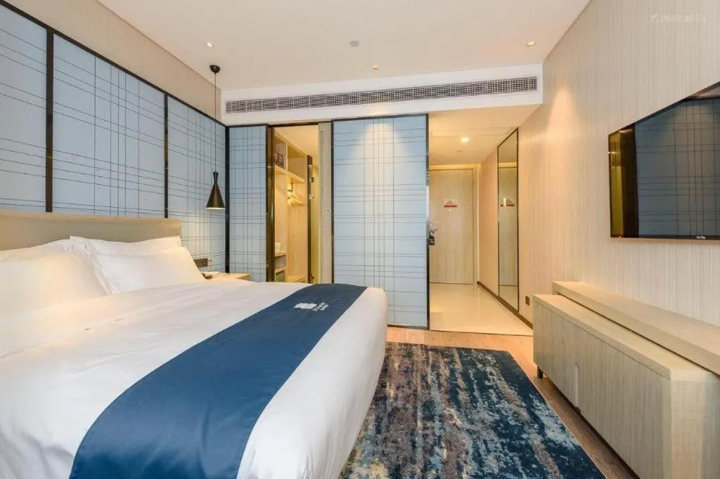 Bed in Echarm Hotel Nanning Qingxiu Mountain