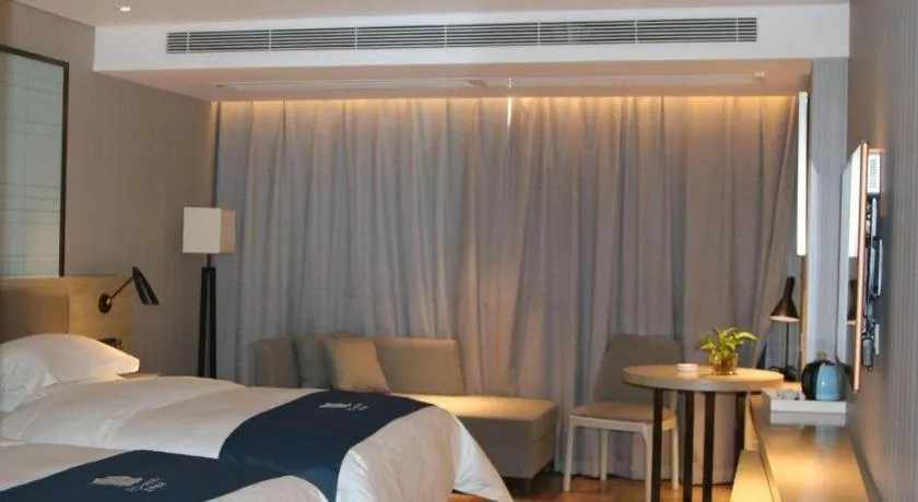 Bed in Echarm Hotel Nanning Qingxiu Mountain