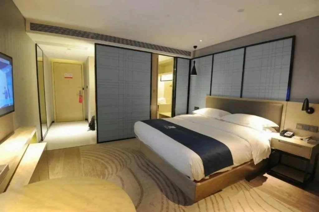 Bed in Echarm Hotel Nanning Qingxiu Mountain