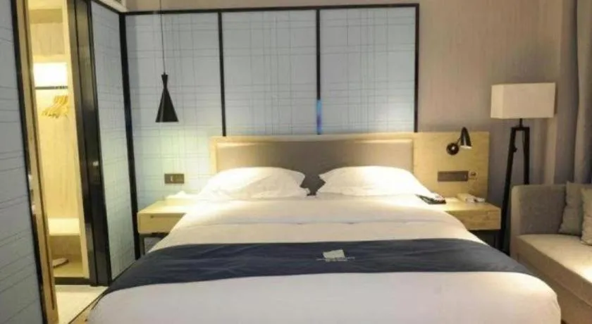 Bed in Echarm Hotel Nanning Qingxiu Mountain