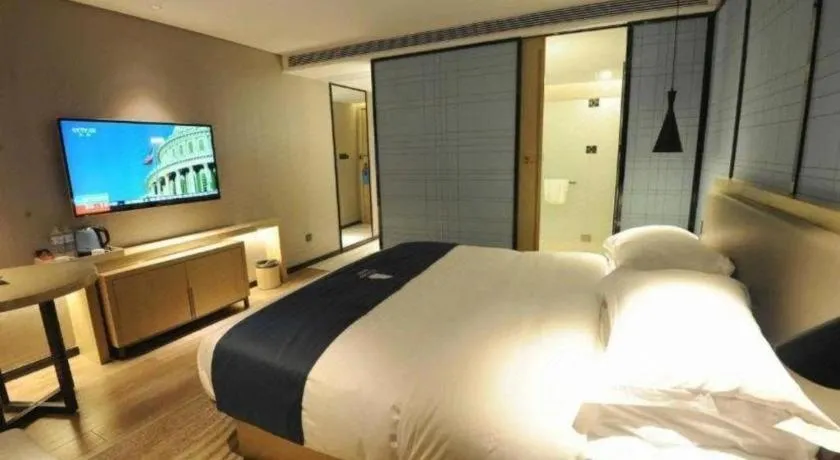 Bed in Echarm Hotel Nanning Qingxiu Mountain