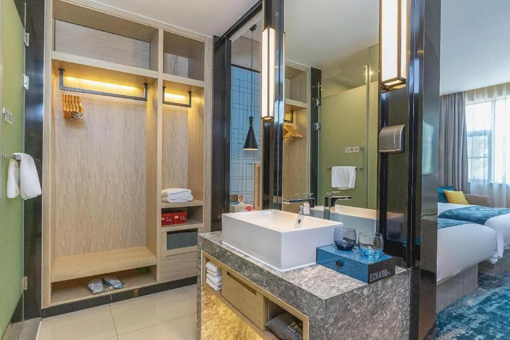 Bed in Echarm Hotel Nanning Qingxiu Mountain