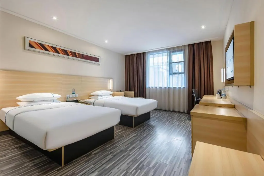 Bed in City Comfort Inn Guangzhou Renhe Metro Station Huatong Plaza