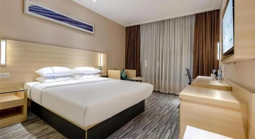 Bed in City Comfort Inn Guangzhou Renhe Metro Station Huatong Plaza