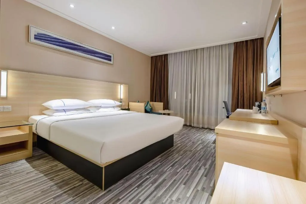 Bed in City Comfort Inn Guangzhou Renhe Metro Station Huatong Plaza