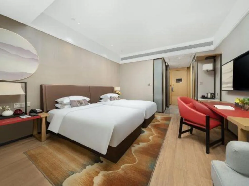 Bed in Echeng Hotel Nanning Jiangnan Wanda Baisha Avenue