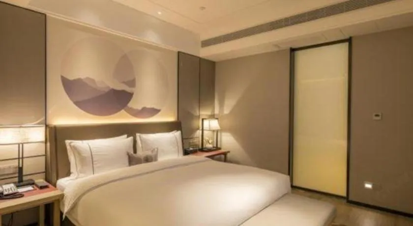 Bed in Echeng Hotel Nanning Jiangnan Wanda Baisha Avenue
