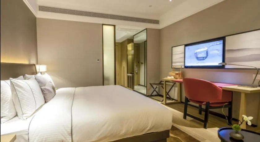 Bed in Echeng Hotel Nanning Jiangnan Wanda Baisha Avenue