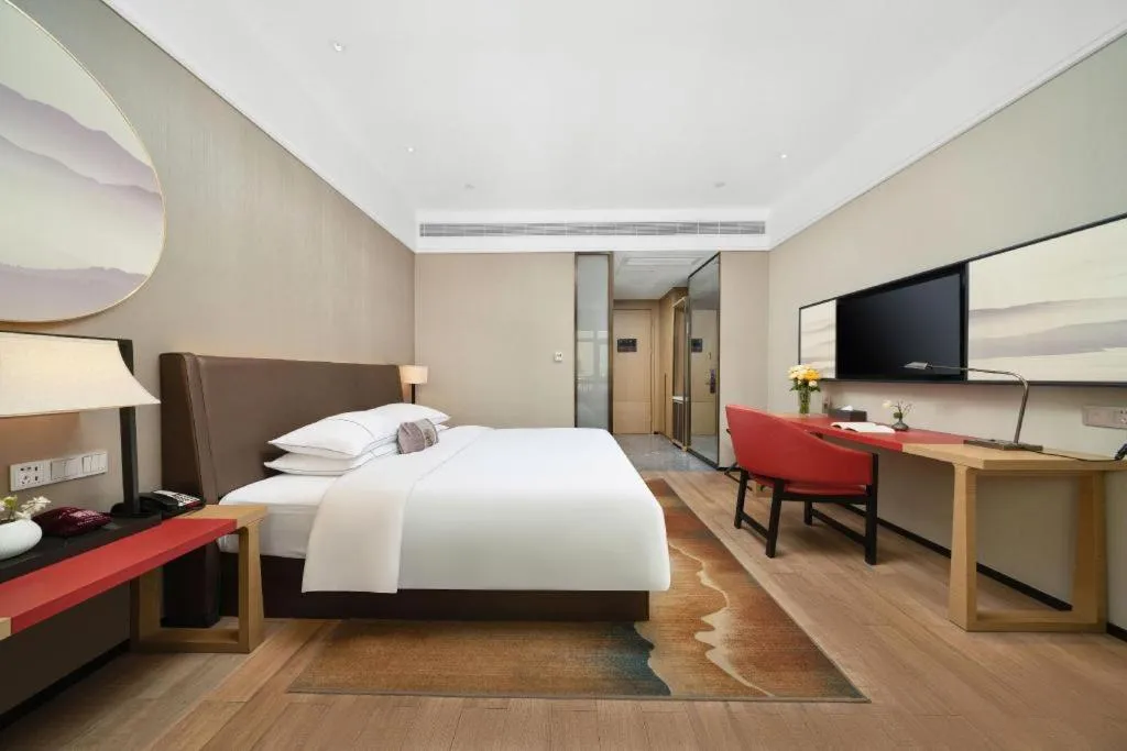 Bed in Echeng Hotel Nanning Jiangnan Wanda Baisha Avenue