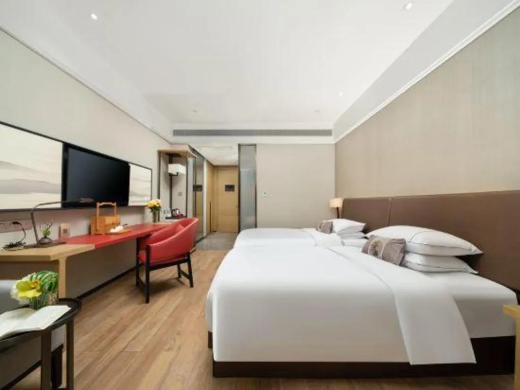 Bed in Echeng Hotel Nanning Jiangnan Wanda Baisha Avenue