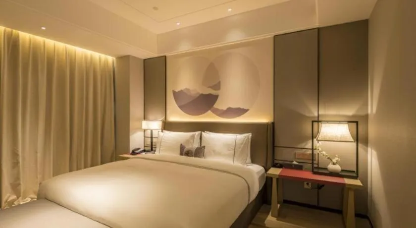 Bed in Echeng Hotel Nanning Jiangnan Wanda Baisha Avenue