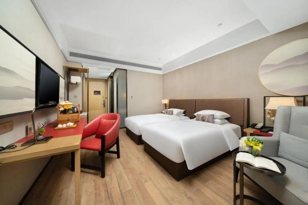 Bed in Echeng Hotel Nanning Jiangnan Wanda Baisha Avenue