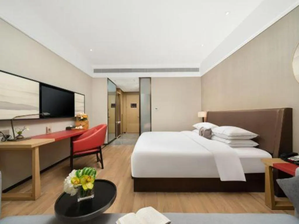 Bed in Echeng Hotel Nanning Jiangnan Wanda Baisha Avenue