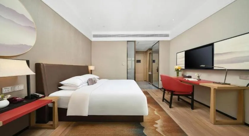 Bed in Echeng Hotel Nanning Jiangnan Wanda Baisha Avenue