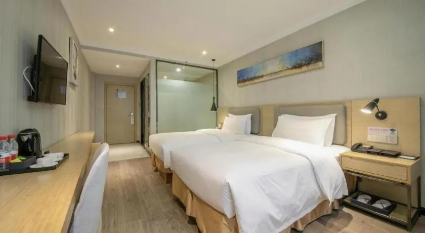 Bed in Borrman Hotel Wuhan Yangluo Metro Station Shenshuigang