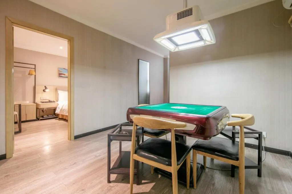 Bed in Borrman Hotel Wuhan Yangluo Metro Station Shenshuigang