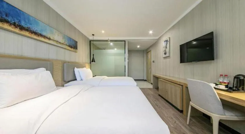 Bed in Borrman Hotel Wuhan Yangluo Metro Station Shenshuigang