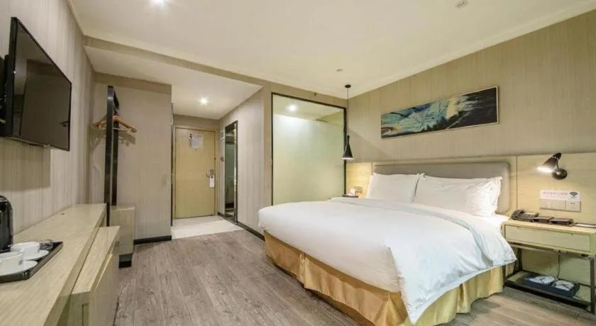 Bed in Borrman Hotel Wuhan Yangluo Metro Station Shenshuigang